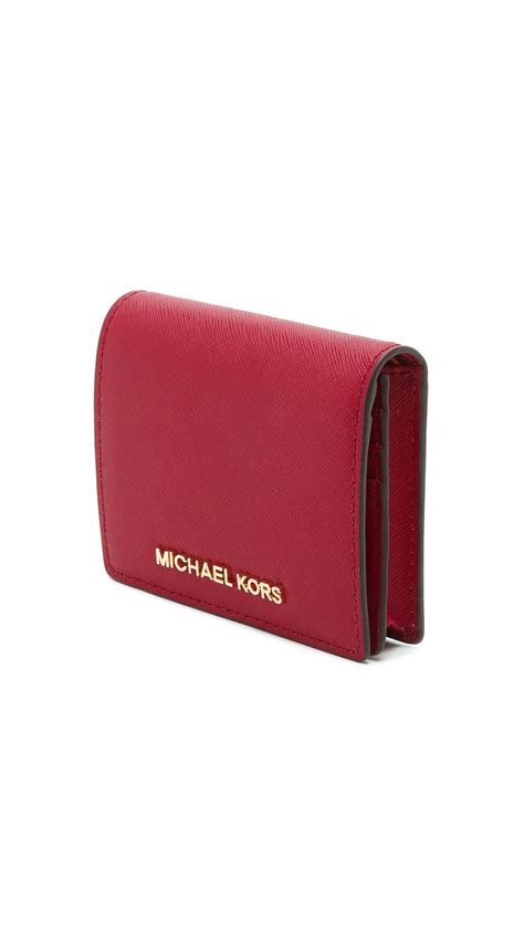 michael kors travel tech wallet|Michael Kors dark cherry wallet.